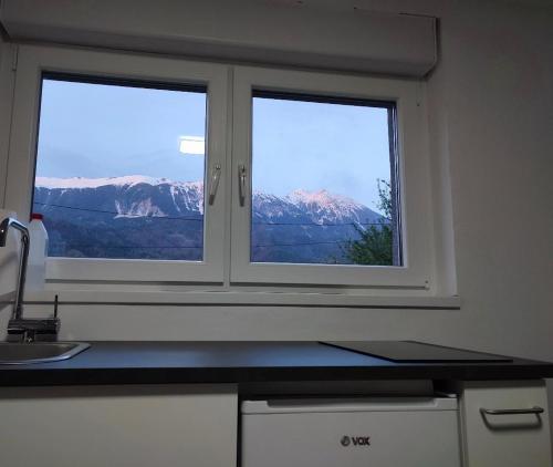 Nespecifikovaný výhled na hory nebo výhled na hory při pohledu z apartmánu