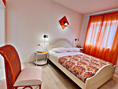 Postel nebo postele na pokoji v ubytování Residenza Delfina