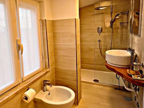 Koupelna v ubytování Residenza Delfina