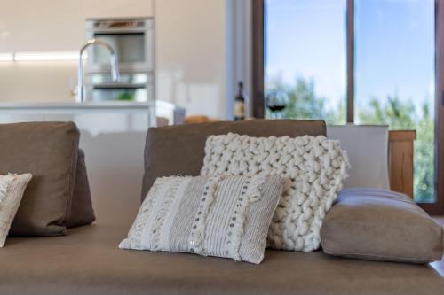 a couch with two pillows on it in a kitchen at Italian Experience-Villa Clair in Fermo