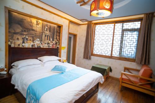 Letto o letti in una camera di Mount Emei Teddy Bear Hotel玩具熊酒店