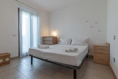 Una cama o camas en una habitación de Italian Experience-CasAmare