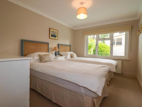 Ένα ή περισσότερα κρεβάτια σε δωμάτιο στο 6 Trelawney Court