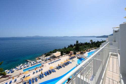 an aerial view of a resort with a swimming pool at Sunshine Corfu Hotel And Spa in Nisakion