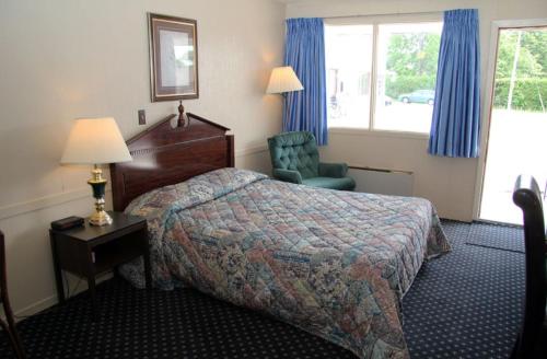 Postel nebo postele na pokoji v ubytování Diamond Motor Inn