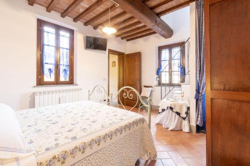 A bed or beds in a room at Italian Experience-Il Borgo Apartment