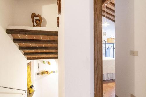 a view of a kitchen from the hallway of a house at Italian Experience-Il Borgo Apartment in Bientina