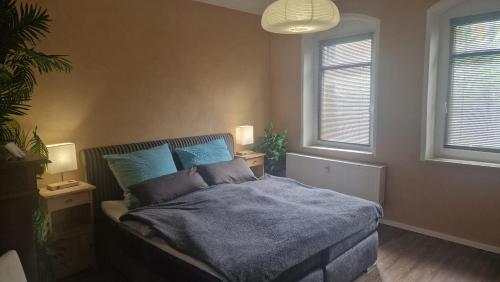 Postel nebo postele na pokoji v ubytování Ferienwohnung Winternest