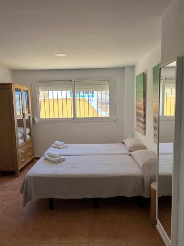 Letto o letti in una camera di Hospedería Almundo by Alexandra Realty