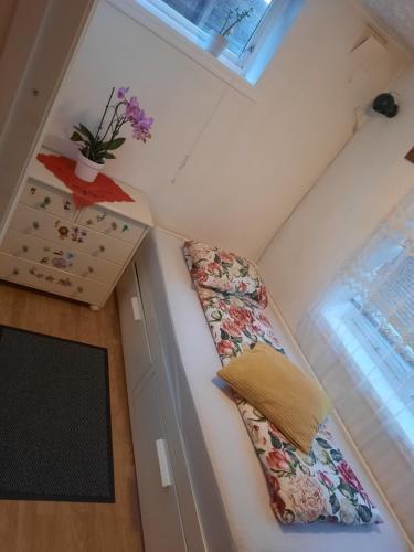 a room with two ties hanging on a wall at Gabriel's Home in Stavanger