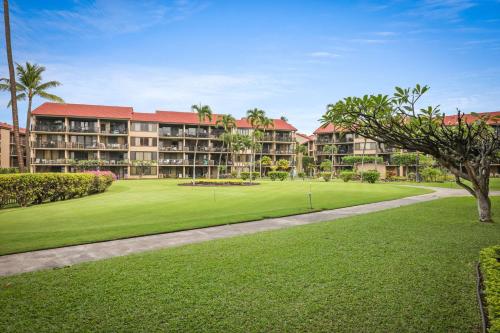 a view of a resort with a golf course at Aston at Papakea Resort in Lahaina