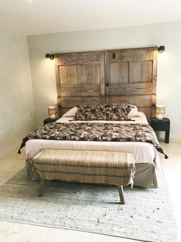 Cama o camas de una habitación en Bastide Nomade - guest house