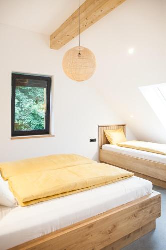 Una cama o camas en una habitación de Mlino Alpino