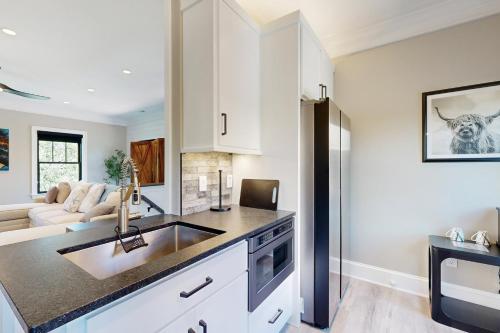 a kitchen with a sink and a counter top at Town of Lewes --- 132 New Rd. in Lewes