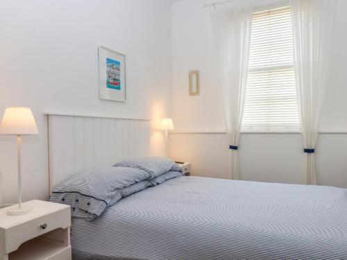 En eller flere senge i et værelse på The Old Greengrocers