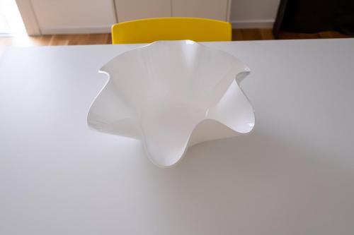 a white table with a pair of glasses on it at FP Apartments Pizzo in Pizzo