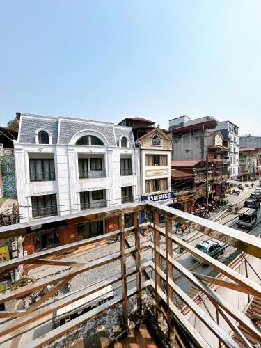 a building under construction on a city street at Ngọc Anh Guest House in Sa Pa