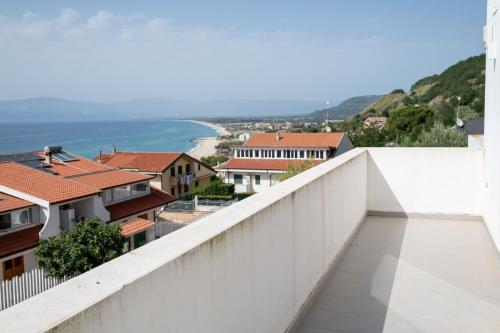 a view of the ocean from the balcony of a house at FP Apartments Pizzo in Pizzo