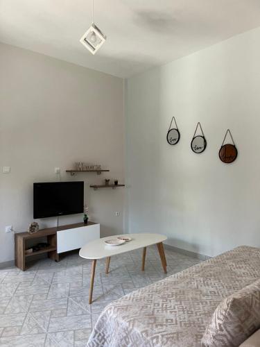 Postel nebo postele na pokoji v ubytování Tilemaxos Apartment