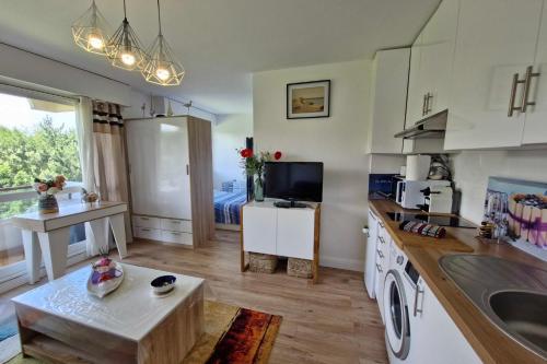 Photo de la galerie de l'établissement Bright studio near the sea, à Villers-sur-Mer