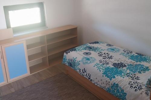 Postel nebo postele na pokoji v ubytování Sušek