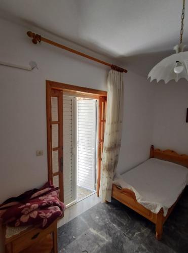 Postel nebo postele na pokoji v ubytování Parga Center Rooms