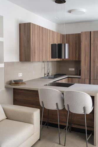Η κουζίνα ή μικρή κουζίνα στο Plaka House - Boutique Apartments