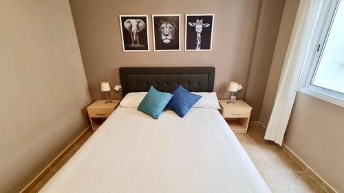 Ένα ή περισσότερα κρεβάτια σε δωμάτιο στο Apartamento Aloha Delta