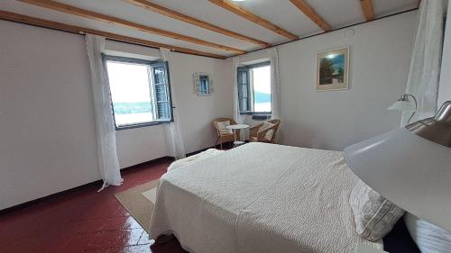Postel nebo postele na pokoji v ubytování Residenza Le Camelie