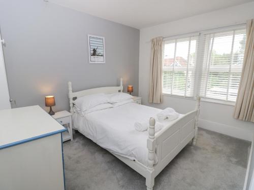 Postel nebo postele na pokoji v ubytování The Anchorage