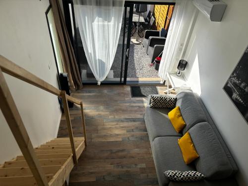 Posezení v ubytování Logement du Sud avec Jacuzzi