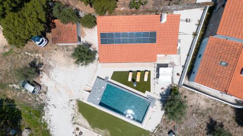an overhead view of a building with a swimming pool at Casas de Marvão - Quinta da Bela Vista in Marvão