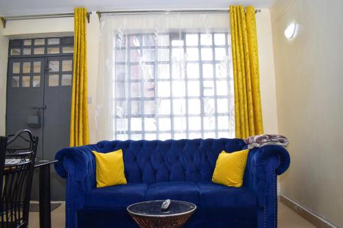 Posezení v ubytování Faisha 1br near Sarova Woodlands with views of lake Nakuru
