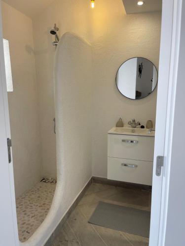 a bathroom with a sink and a mirror at Monte da Lua in Montargil