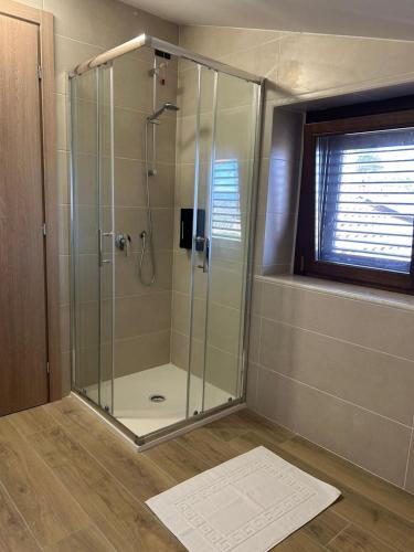 a shower with a glass enclosure in a bathroom at Green Residence Villa Assunta in Moscufo