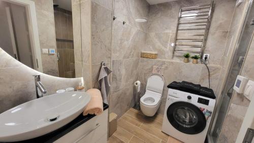 Ένα μπάνιο στο Apartmán Adela - AD Nezábudka,Tatranská Štrba