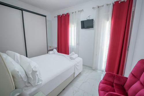 A bed or beds in a room at Maria's Home