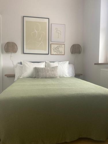 En eller flere senge i et værelse på Trinity Suite