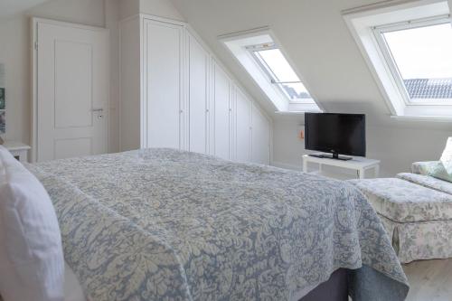 Posteľ alebo postele v izbe v ubytovaní Strand Loft