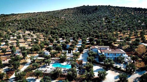 an aerial view of a resort with a pool at AGRICAMPEGGIO - SOLO PIAZZOLE VUOTE - Agriturismo Passione Natura in Vieste