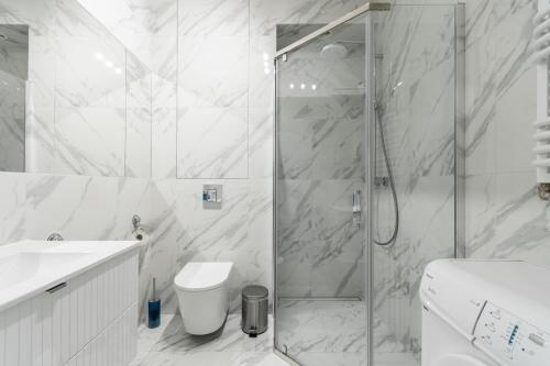 Koupelna v ubytování Molo Centrum by Grand Apartments