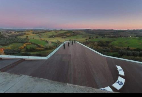 a skateboard ramp with people standing on top of it at La Casa del Borgo in Peccioli