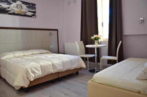 Posteľ alebo postele v izbe v ubytovaní Florence Stadium B&B