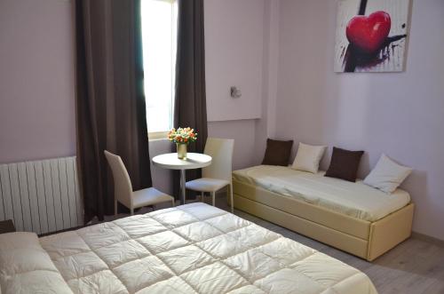 Postel nebo postele na pokoji v ubytování Florence Stadium B&B
