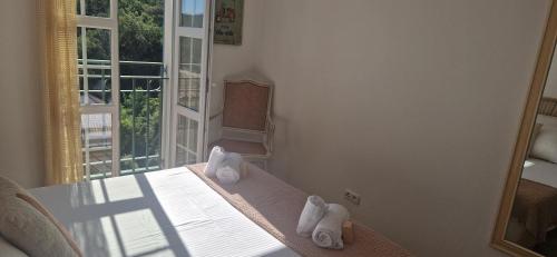 Ένα ή περισσότερα κρεβάτια σε δωμάτιο στο Appartement clim, parking, wifi