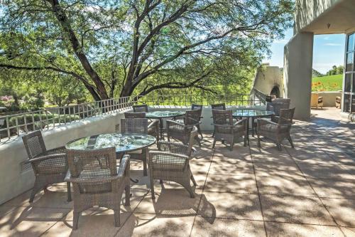 a group of tables and chairs on a patio at Starr Pass Golf Suites in Tucson