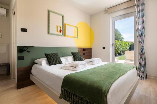 Postel nebo postele na pokoji v ubytování B&B Relais One