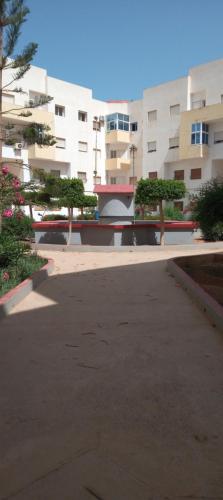 an empty parking lot in front of a building at Nador al jadid chaabi in Nador