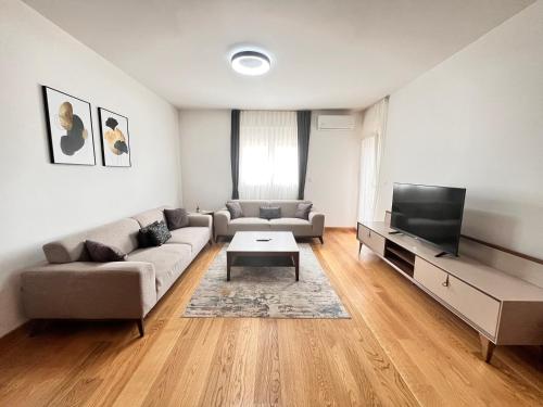 Area soggiorno di New City Luxury Apartments