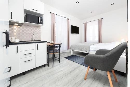 Η κουζίνα ή μικρή κουζίνα στο Apartments Volta See view